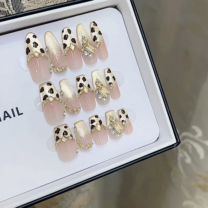 Artistic Press-On Nail Set with Leopard Accents Bowlift
