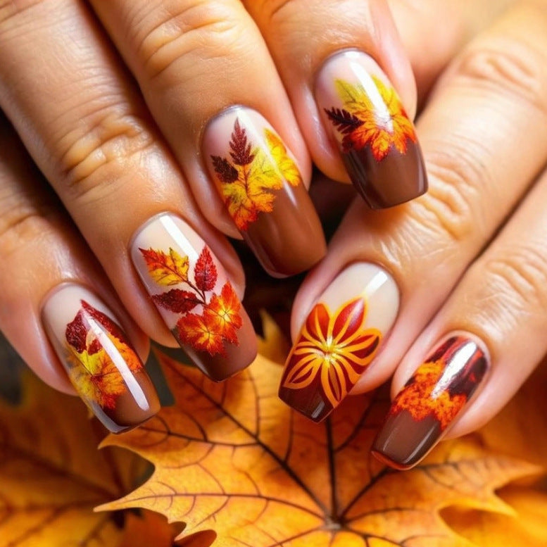 Artificial nails in elegant autumn design with leaf motifs Bowlift