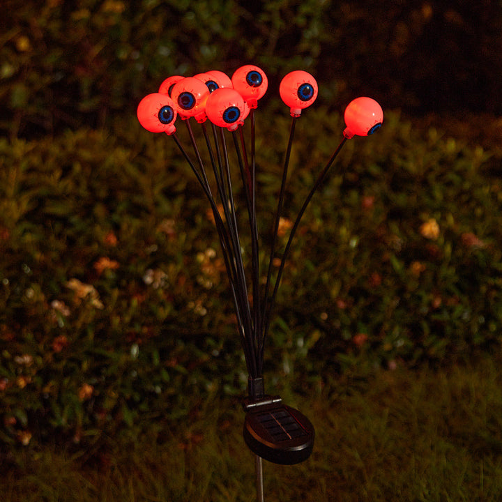 Creepy garden lights with eye motif Bowlift