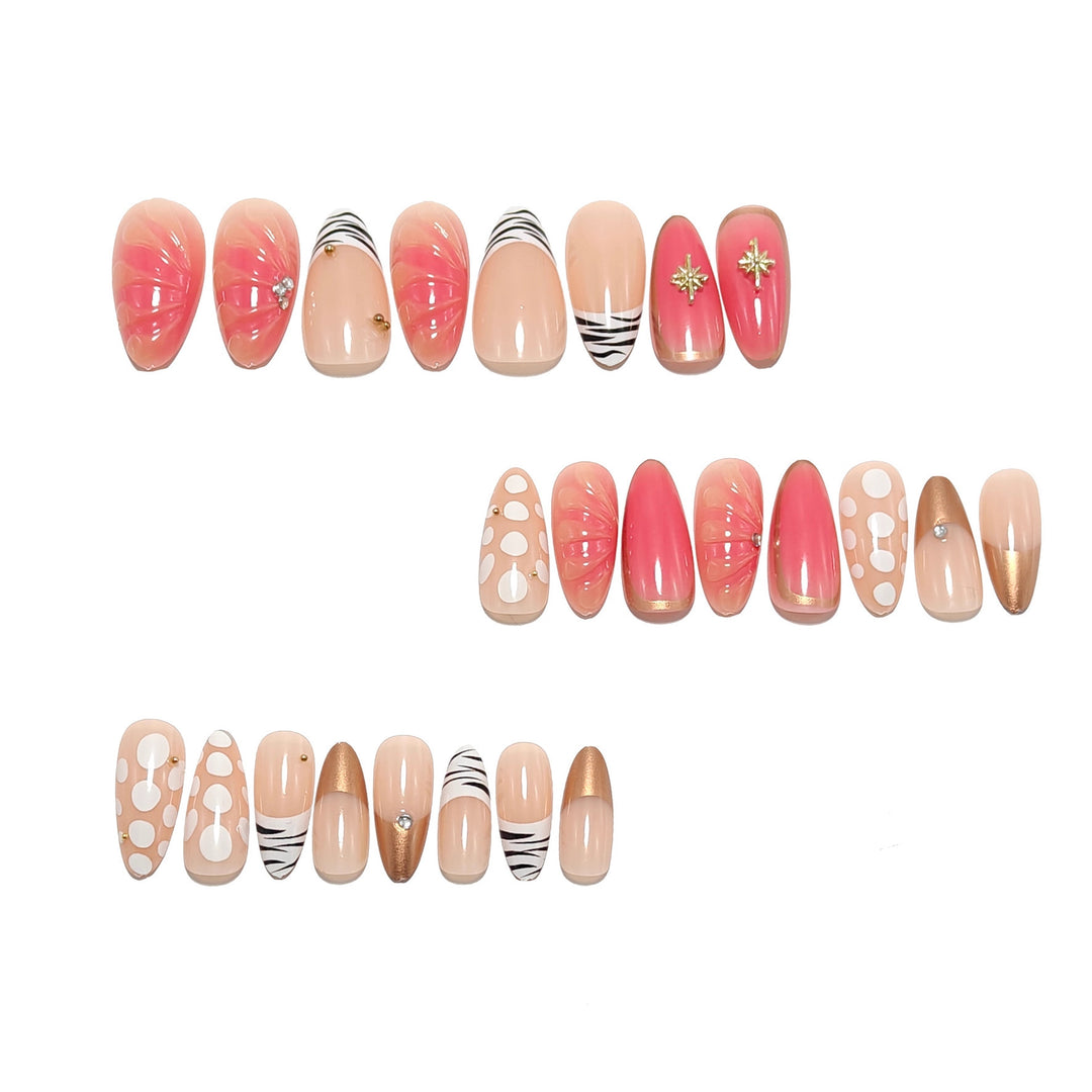 Acrylic nail set with elegant gold design and floral decor Bowlift