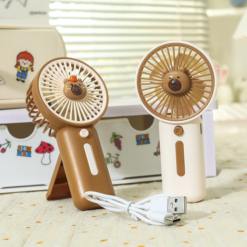Unisex nano compact battery handheld fan with clip function and brushless whisper drive Bowlift