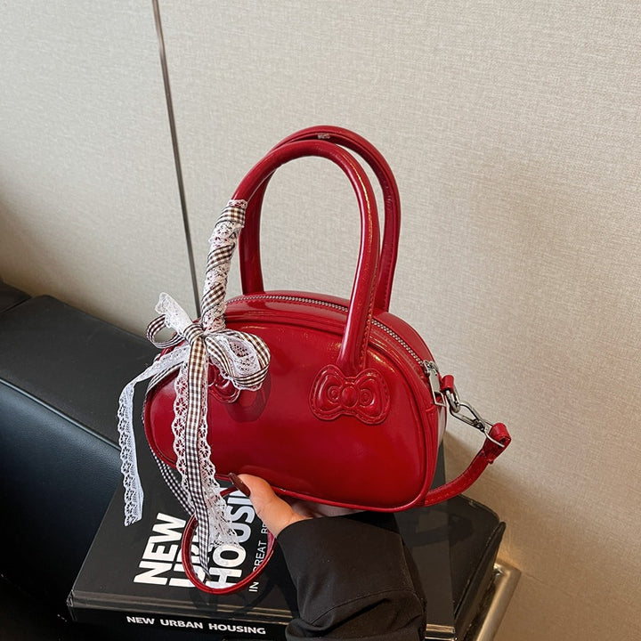 Elegant Bow-Detail Handheld Satchel Bowlift