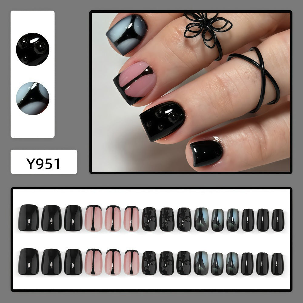 Artificial nails with elegant black and pastel accent design Bowlift
