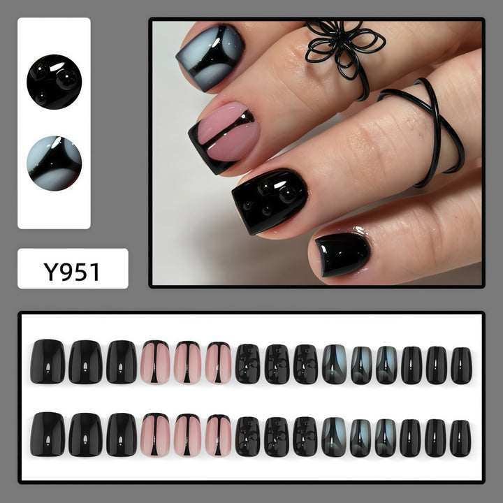 Artificial nails with elegant black and pastel accent design Bowlift