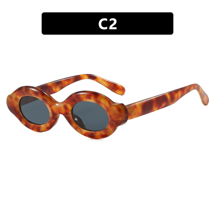 Women's sunglasses in trendy retro design with oval lenses Bowlift