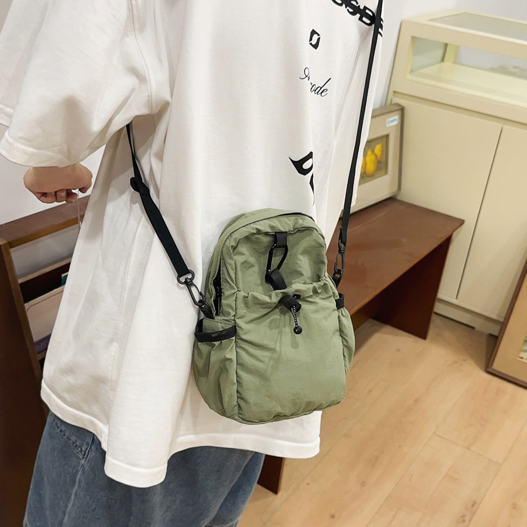 Practical crossbody backpack with multifunctional compartments Bowlift