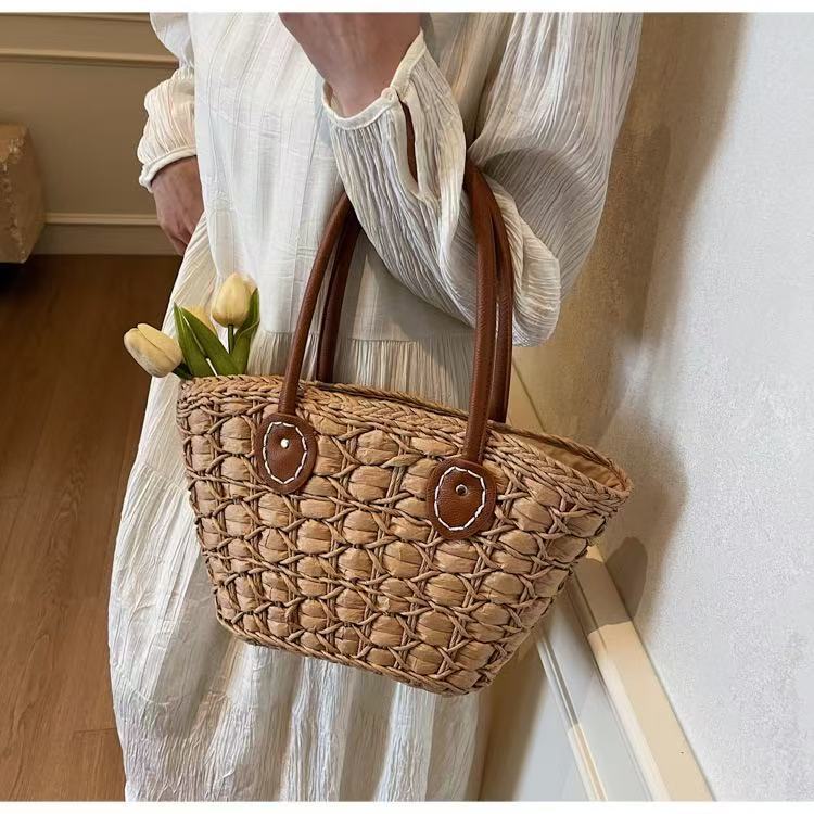 Handcrafted basket bag with elegant leather accents Bowlift