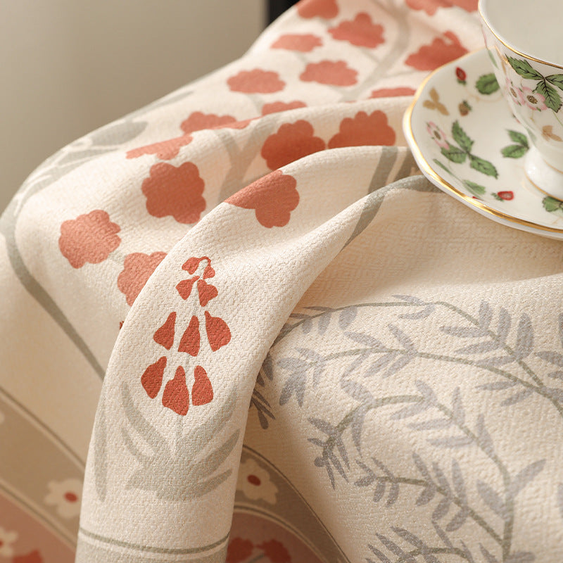 Rectangular easy-care tablecloth in floral jacquard with decorative border Bowlift