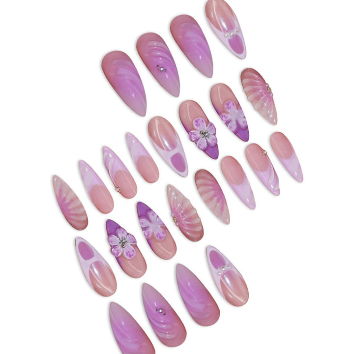 Artistic Stiletto Press-On Nail Art with Floral and Gemstone Accents Bowlift