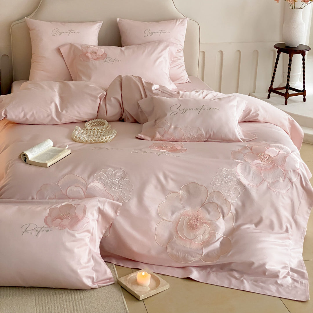 Satin bedding set with floral relief embroidery and velvety shine Bowlift