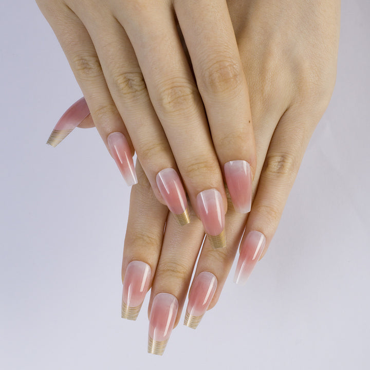 Acrylic Nail Set with Elegant Ombre Design and Golden Accents Bowlift