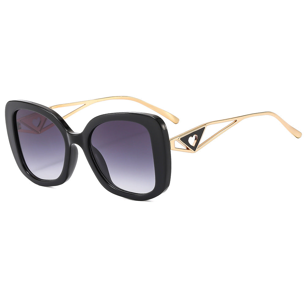 Ladies fashionable oversized sunglasses with luxurious heart detail Bowlift