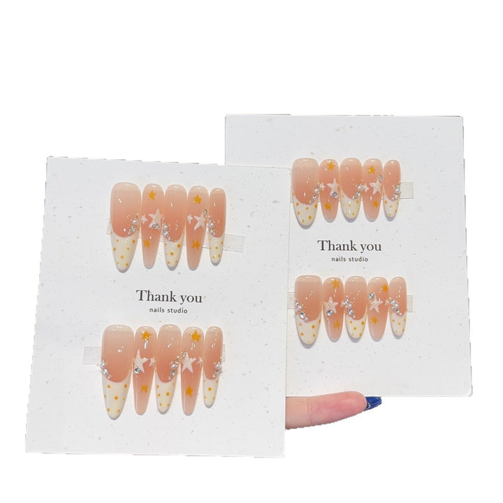 Artificial artificial nails with elegant star and glitter accents Bowlift
