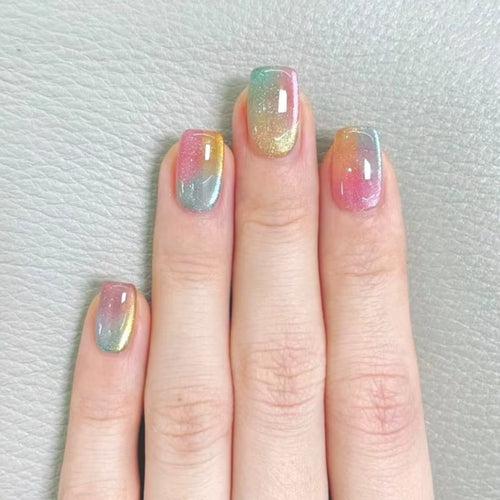 Artificial nails in delicate ombre design with glitter effects Bowlift