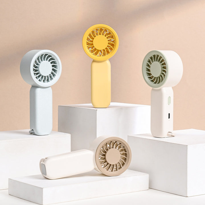 Unisex compact portable handheld fan with rechargeable battery quiet operation ergonomic handle and carrying strap Bowlift