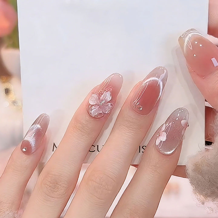 Artificial nail set with sparkling glitter accents Bowlift