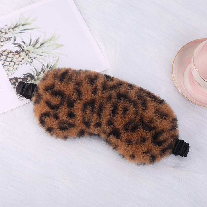 Women's cuddly faux fur sleep mask with heart-embossed surface and gathered comfort band Bowlift