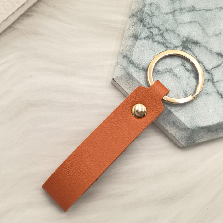Unisex keychain with elegant artificial leather design Bowlift