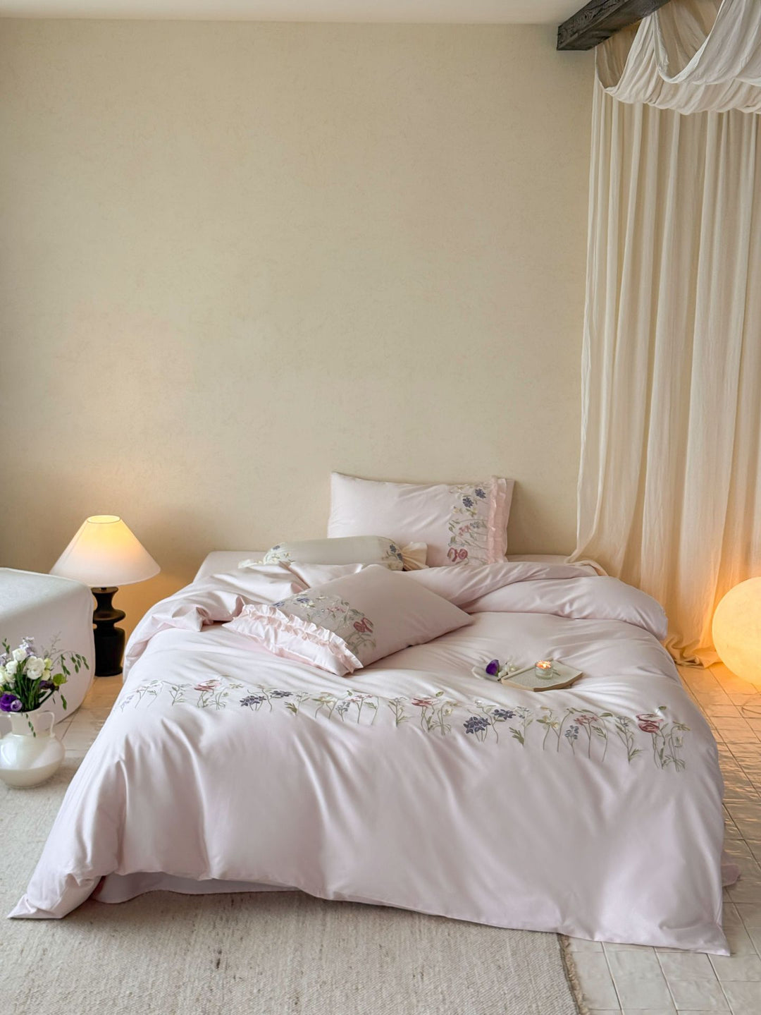 Fine satin bed linen set with delicate botanical embroidery and ruffled edge Bowlift