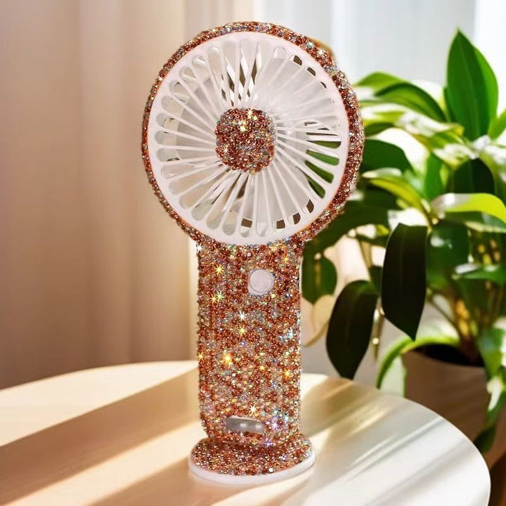 Women's portable hand fan rechargeable with rhinestone accents and cat emblem Bowlift