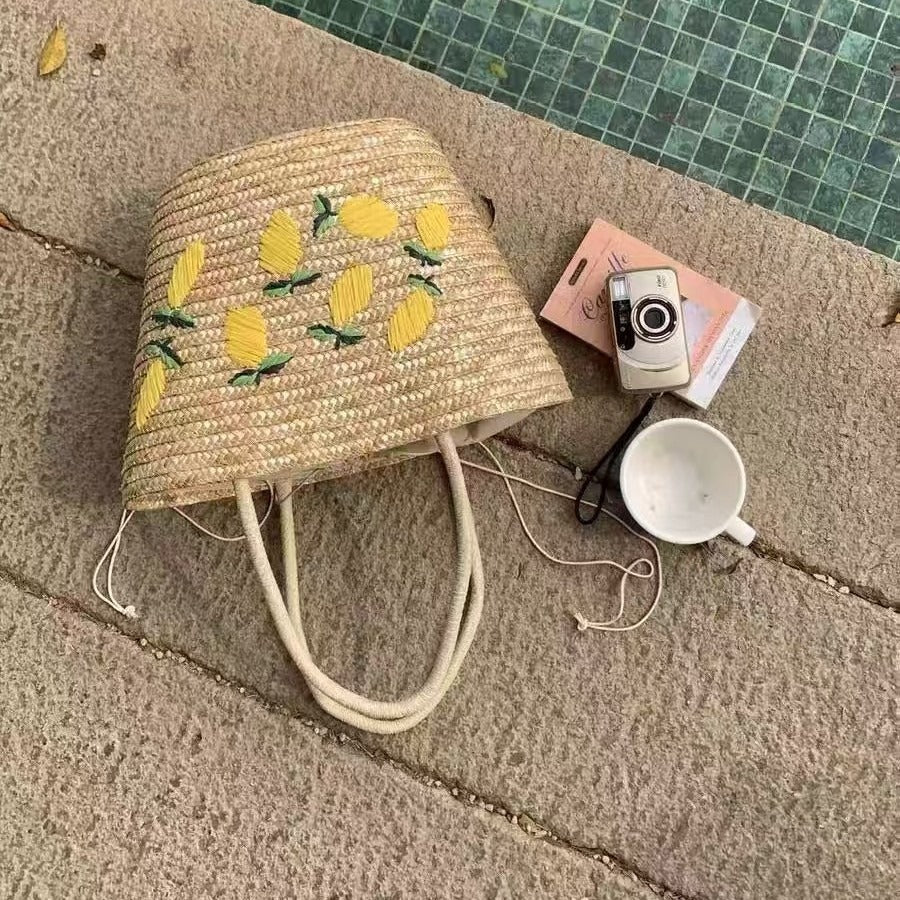 Spacious straw bag with lemon embroidery Bowlift