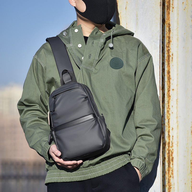 Compact sling backpack with multifunctional storage compartments Bowlift