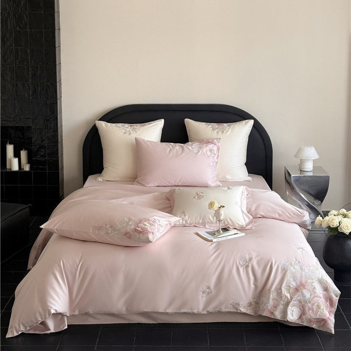 Satin bedding set with floral relief embroidery and velvety shine Bowlift