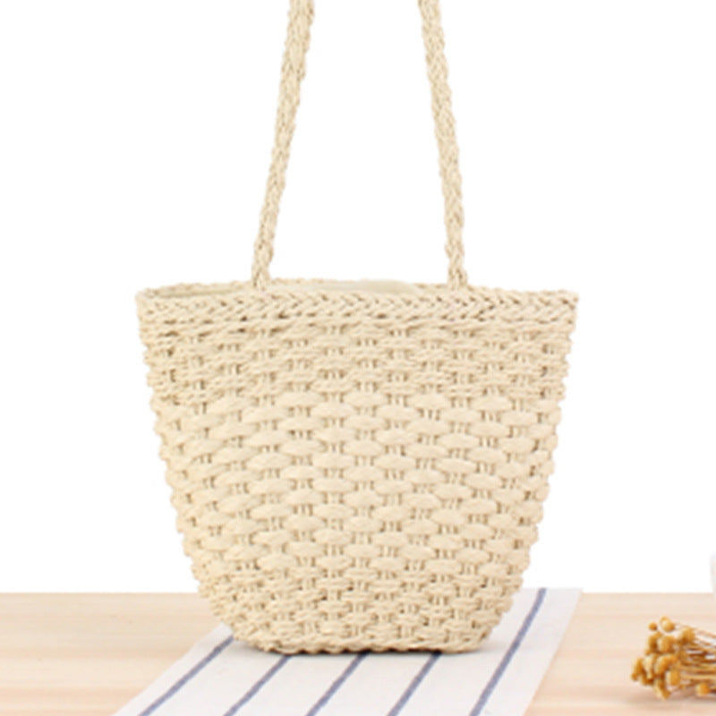 Braided handbag made of natural raffia with robust carrying straps Bowlift