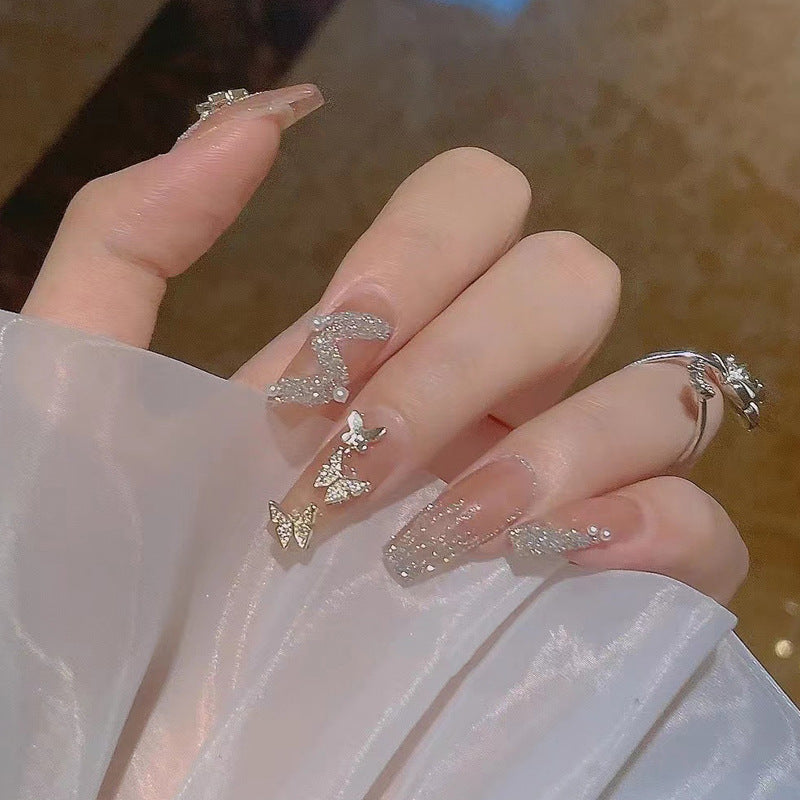 Artificial nails with sparkling rhinestone and butterfly design Bowlift