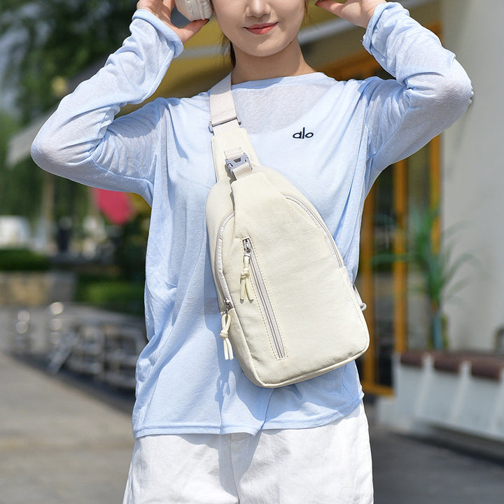 Sling Backpack with Ergonomic Carrying System and Multiple Compartments Bowlift