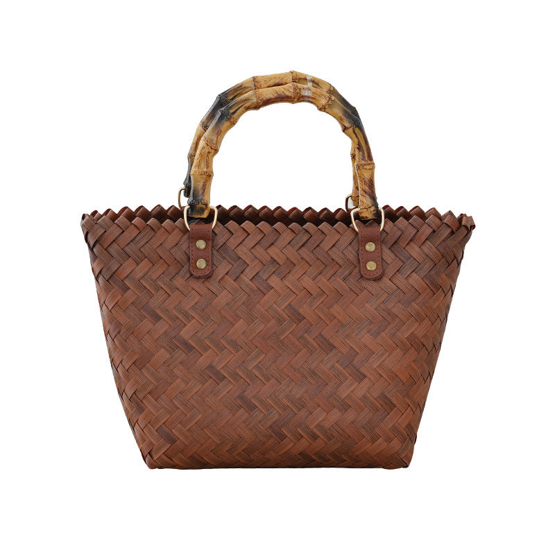 Handbag Made of Woven Bast Bowlift