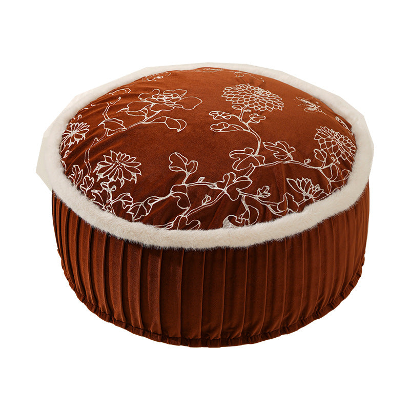 Round velvet decorative bench with floral embroidery and faux fur trim