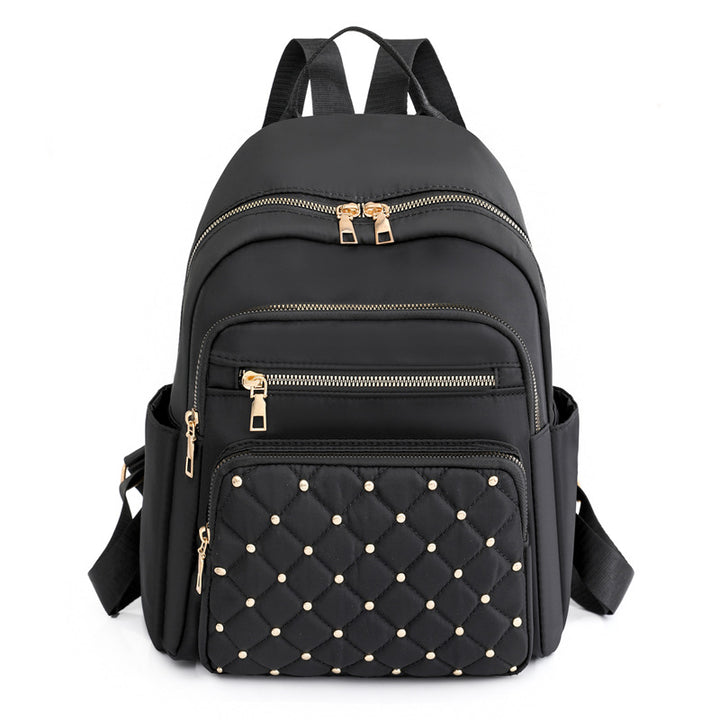 Quilted Backpack with Decorative Studs Bowlift