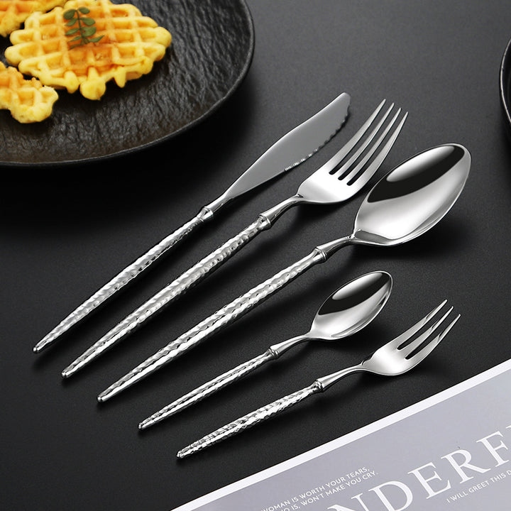 Elegant soup spoon with structured handle Bowlift
