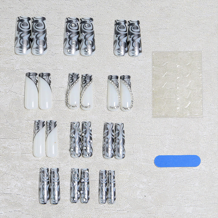 Acrylic nail set with elegant patterns and sparkling accents Bowlift