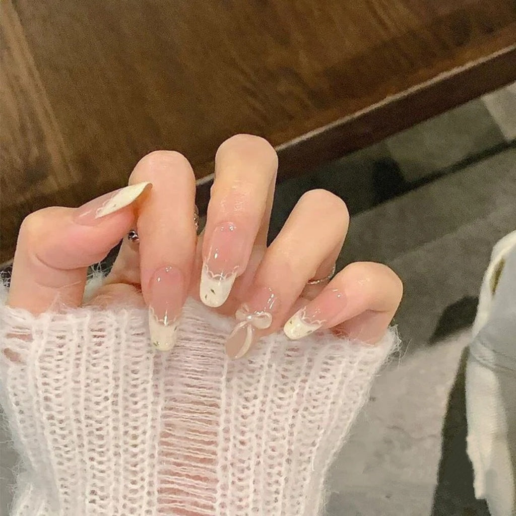 Artistic Long Stiletto Press-On Nails with Floral and Gemstone Accents Bowlift
