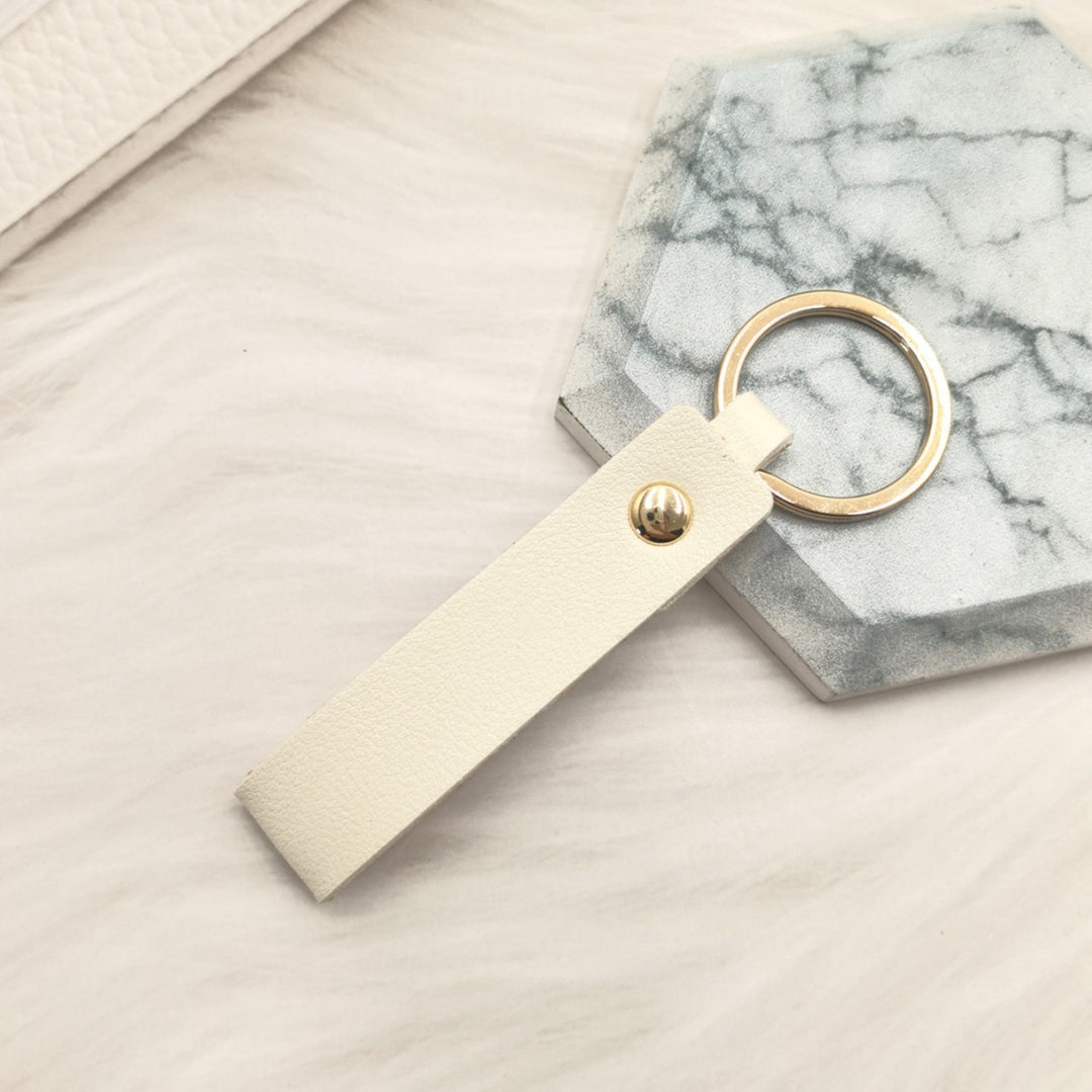 Unisex keychain with elegant artificial leather design Bowlift