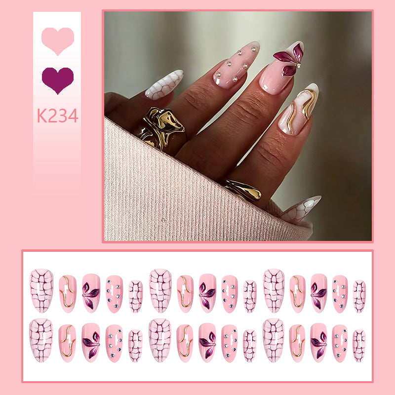 Acrylic nail set with glamorous design and sparkling accents Bowlift
