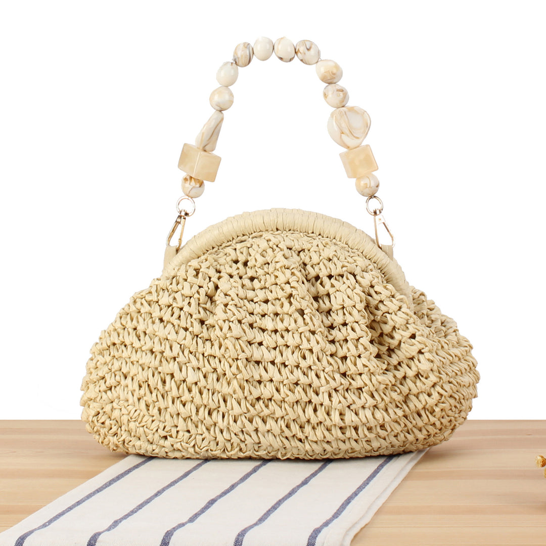 Handbag with innovative bead handle Bowlift
