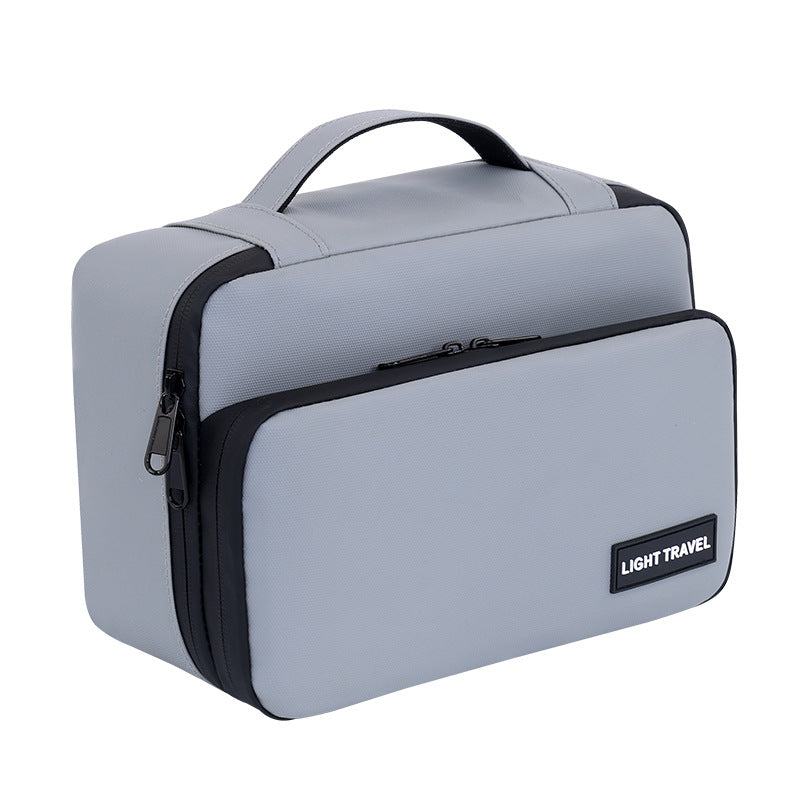 Cosmetic bag with practical organizer and sturdy carrying handle Bowlift