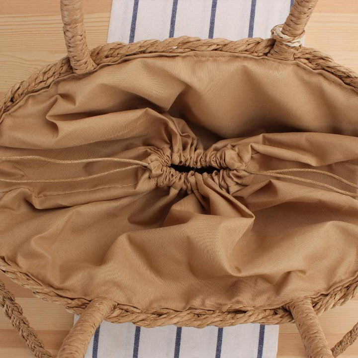 Elegant Bast Shoulder Bag with Tassels and Reinforced Handle Bowlift