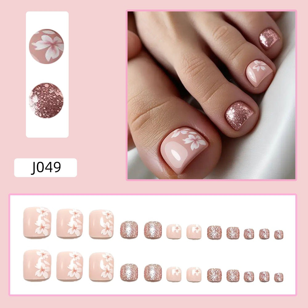 Artificial nail set with floral and glittering accents Bowlift