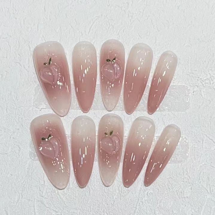Elegant Press-On Almond Nail Set with Heart Detail Bowlift
