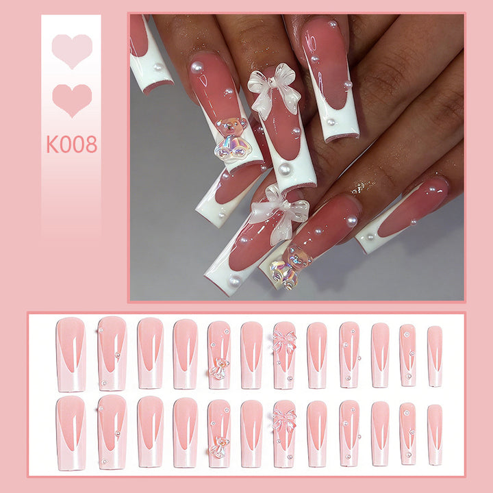 Elegant artificial nails with delicate bows and pearls Bowlift