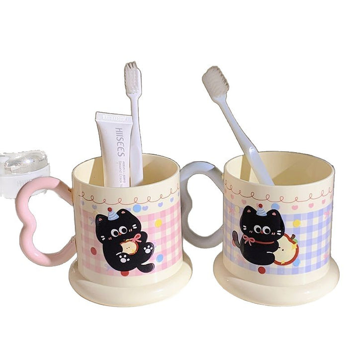 Ceramic mug with playful cat motif Bowlift