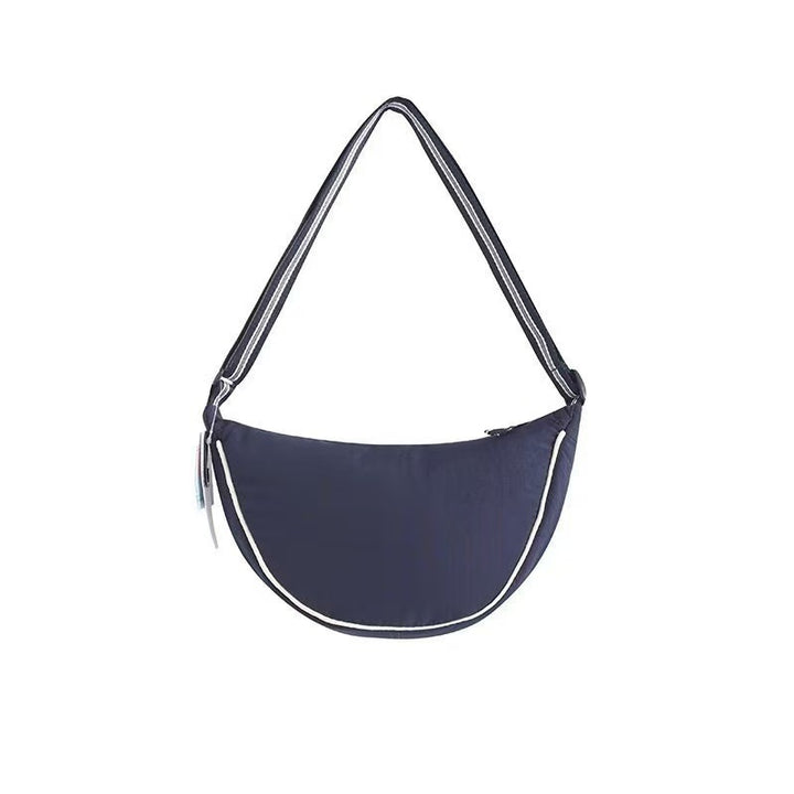 Shoulder bag with adjustable shoulder strap and versatile interior compartment Bowlift