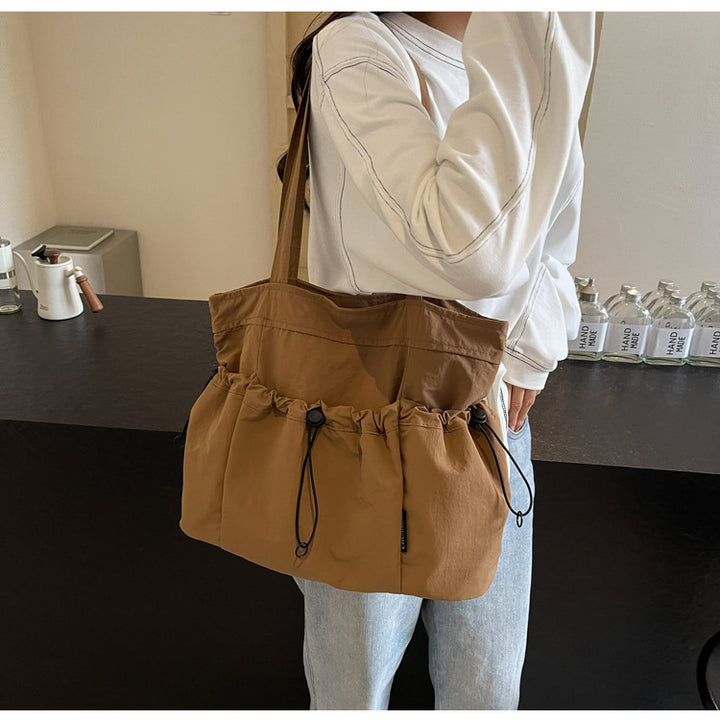 Practical everyday handbag with drawstring Bowlift