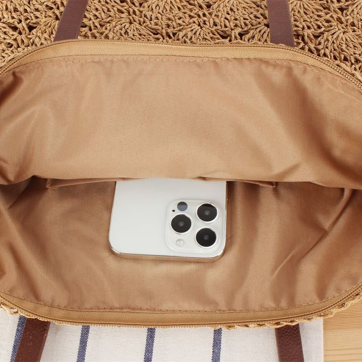 Stylish handbag made of woven natural material Bowlift