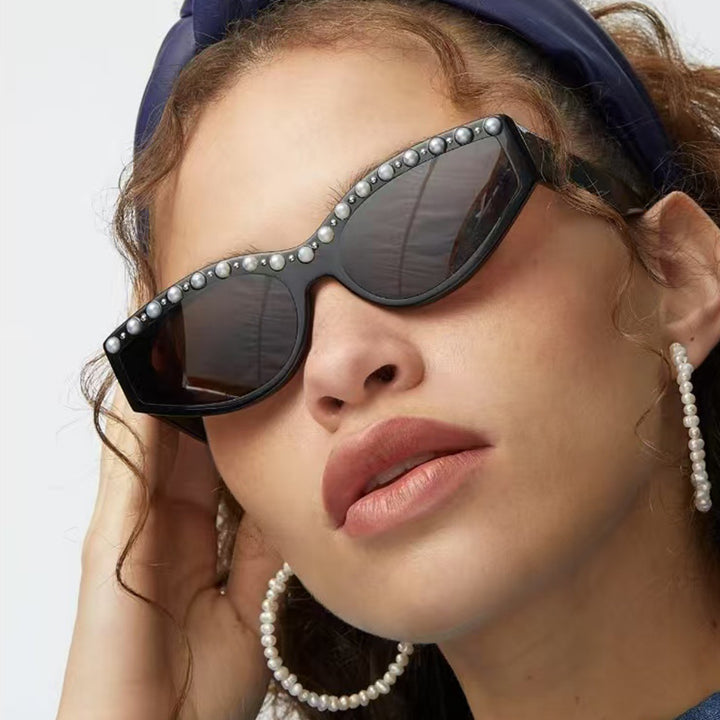 Women's Cat-Eye Sunglasses with Sparkling Rhinestone Accents and Animal Pattern Bowlift
