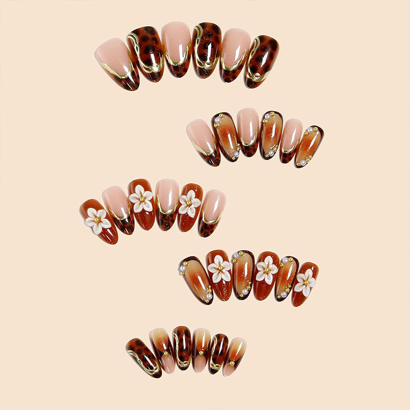 Elegant artificial nails with floral and animal motifs Bowlift